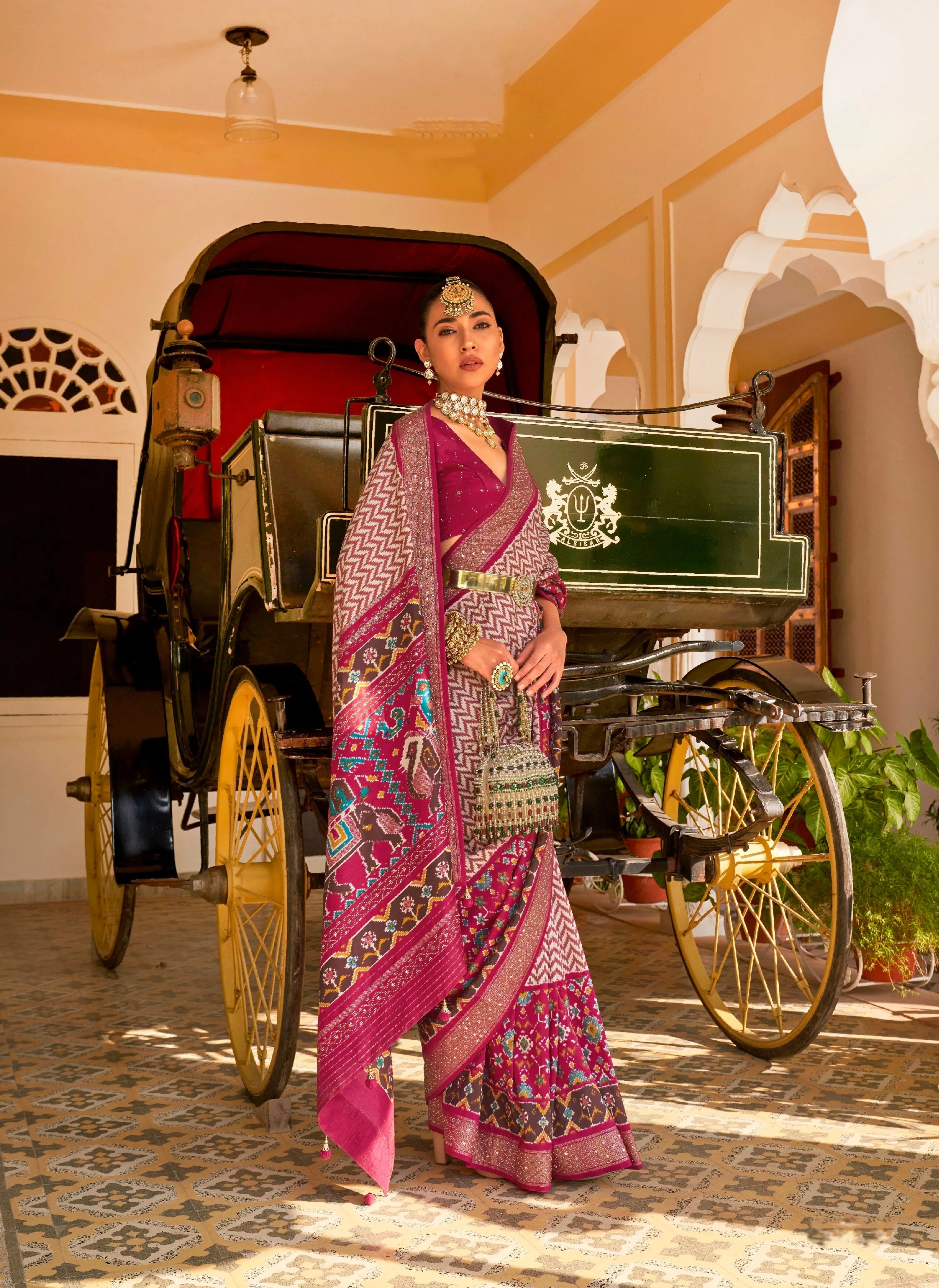 Magenta & Pink Patola Silk Saree with Silver Border and Elephant Pallu